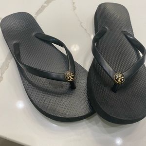 Tory Burch black flip flops size 7